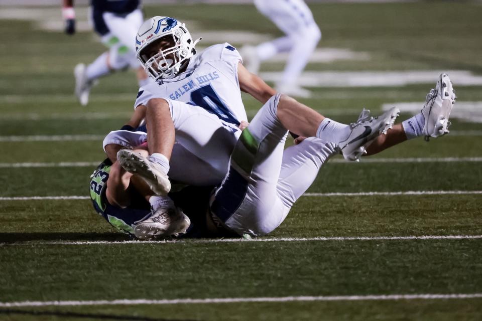 Timpanogos hosts Salem Hills in a high school football game in Orem on Friday, Oct. 6, 2023. | Spenser Heaps, Deseret News