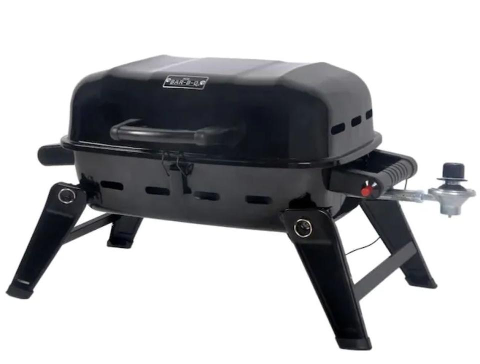 This grill's got a 4.5-star rating and includes a stainless steel burner and black steel hinged lid &mdash; but don't let that fool you, it's designed to go anywhere easily. <br /><br /><strong><a href="https://go.skimresources.com?id=38395X987171&amp;xs=1&amp;xcust=portablegrills-KristenAiken-061121-&amp;url=https%3A%2F%2Fwww.lowes.com%2Fpd%2FMr-Bar-B-Q-Black-Powder-Coated-10000-BTU-178-sq-in-Portable-Lp-Gas-Grill%2F1000754314%3Fcm_mmc%3Daff-_-c-_-prd-_-mdv-_-gdy-_-all-_-0-_-27795-_-0%26placeholder%3Dnull%26gclid%3DEAIaIQobChMIu9--qPip6gIVD4zICh2HVwpoEAQYEyABEgKnGvD_BwE%26gclsrc%3Daw.ds%26irclickid%3DzlAV9VUedxyLTodwUx0Mo37mUkBwvpX%3AP2eB0s0%26irgwc%3D1" target="_blank" rel="noopener noreferrer">Find it for $44.98 at Lowe's</a></strong>.