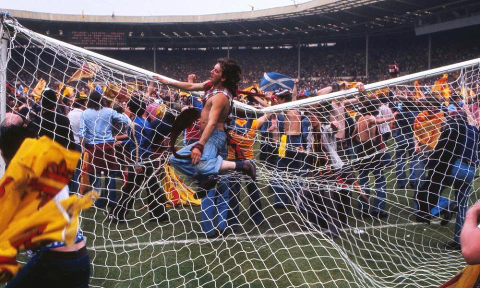 Scotland fans invade the Wembley pitch after the 1977 victory.