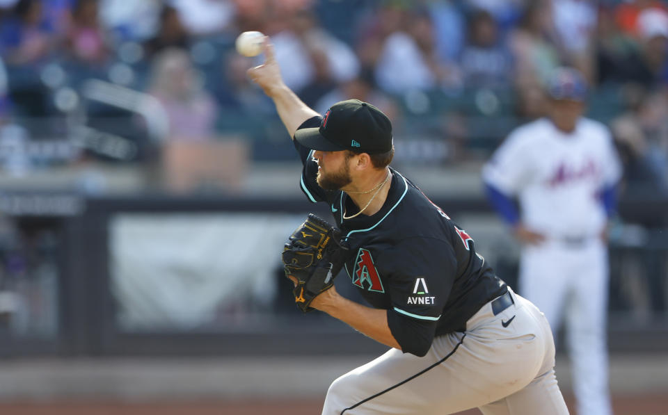 Arizona Diamondbacks' Slade Cecconi pitches against the New York Mets during the third inning of a baseball game, Saturday, June 1, 2024, in New York. (AP Photo/Noah K. Murray)