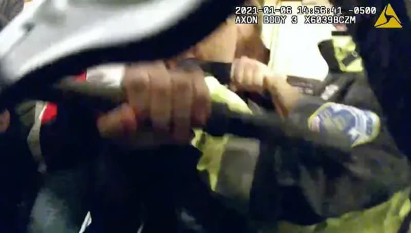 DOJ identified David Walls-Kaufman grappling with police in this Jan. 6 body camera footage. (DOJ)