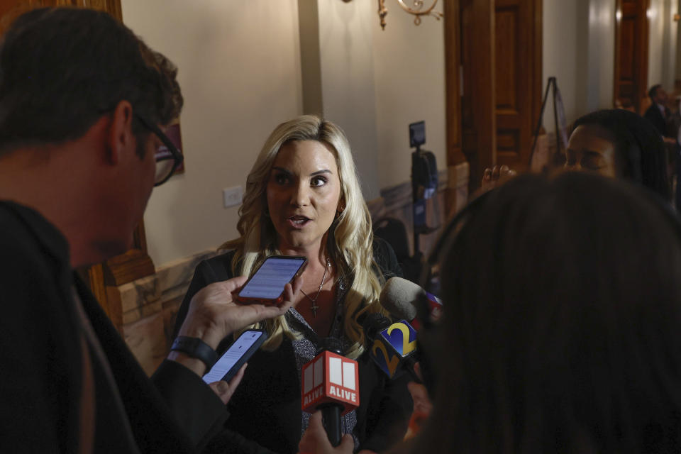 Courtney Kramer speaks to the media after filing paperwork to qualify as a candidate for Fulton County District Attorney at the Georgia State Capitol on Friday, March 8, 2024, in Atlanta. (Natrice Miller/Atlanta Journal-Constitution via AP)