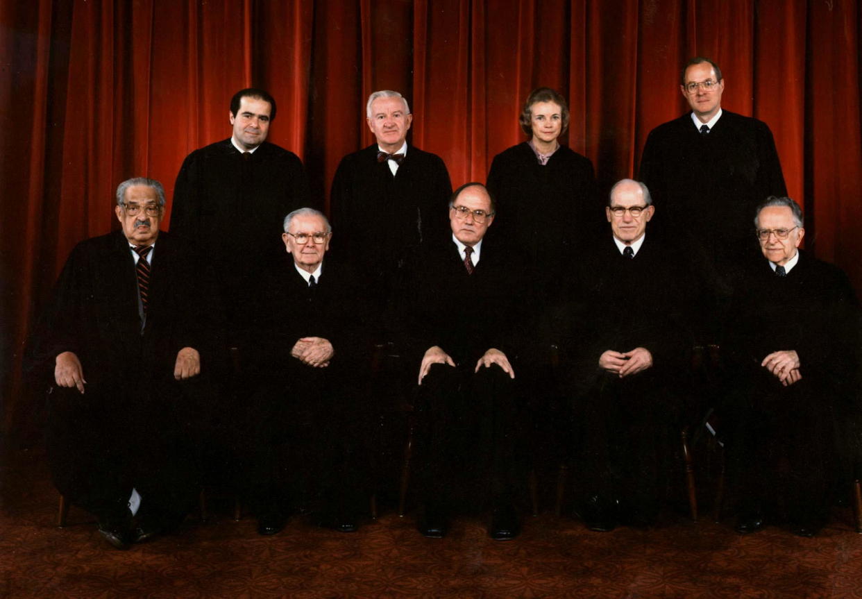 Front row, left to right: Thurgood Marshall, William J. Brennan, Chief Justice William Rehnquist, Byron White, Harry Blackmun. Back row, left to right: Antonin Scalia, Sandra Day O'Connor, John Paul Stevens and Anthony Kennedy. 