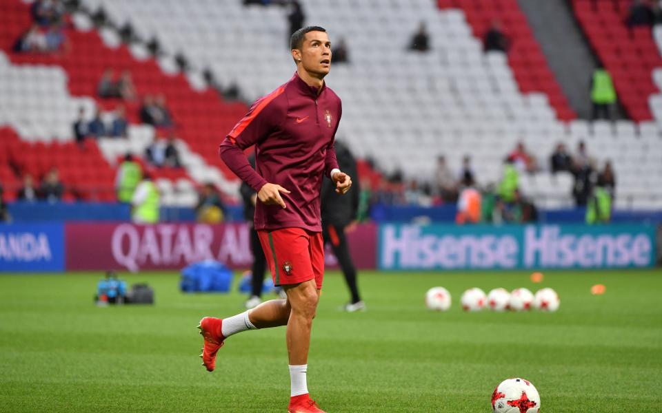 Portugal's forward Cristiano Ronaldo warms-up prior to the 2017 Confederations Cup semi-final - Credit: AFP