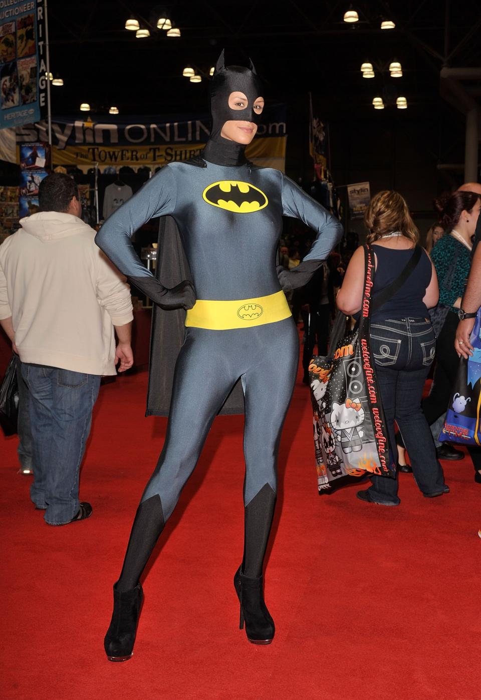 NEW YORK, NY - OCTOBER 11: A Comic Con attendee wearing a Batman costume poses during the 2012 New York Comic Con at the Javits Center on October 11, 2012 in New York City. (Photo by Daniel Zuchnik/Getty Images)