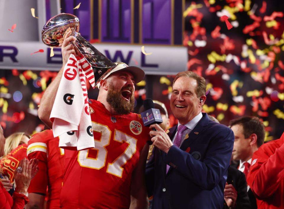 CBS Sports' Jim Nantz interviews Chiefs tight end Travis Kelce after Kansas City's thrilling overtime victory in Super Bowl 58 in Las Vegas.