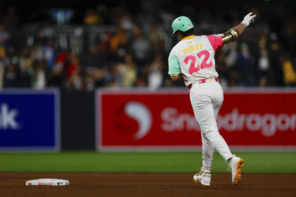 San Diego Padres' Graham Pauley runs the bases after hitting a two-run home run against the Philadelphia Phillies during the seventh inning of a baseball game Friday, April 26, 2024, in San Diego. (AP Photo/Brandon Sloter)