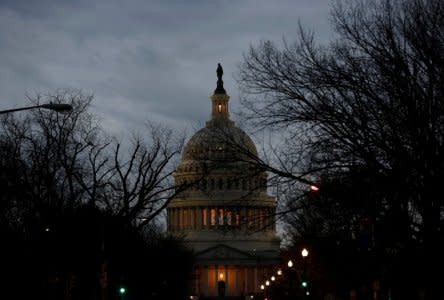 The U.S. Capitol is lit during the second day of a shutdown of the federal government in Washington, U.S., January 21, 2018.      REUTERS/Joshua Roberts