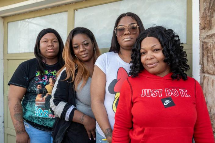 The family of Tyrea Pryor, who was fatally shot by Independence police on Friday, March 11, 2022, gathered to talk about Pryor. The family includes niece Taylor Bozeman, from left, Ebony Findley, mother of Tyrea Pryor’s two children, and Tyrea Pryor’s two sisters Cyrstal Leggs and Marchelle Pryor at Leggs’ home in Kansas City on Tuesday, March 15, 2022. Pryor was fatally shot last Friday by Independence police officers when they saw him display an AR-style rifle following a police pursuit and crash, the Missouri State Highway Patrol said.