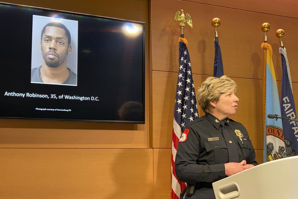 Harrisonburg, Va., Police Chief Kelley Warner discussing murder charges against Anthony Robinson, 35, of Washington, D.C. , at a press conference Friday, Dec. 17, 2021, in Fairfax, Va. Police dubbed their suspect the "shopping cart killer" because he used a grocery shopping cart to move his victims' bodies after killing them. (AP Photo/Matthew Barakat)