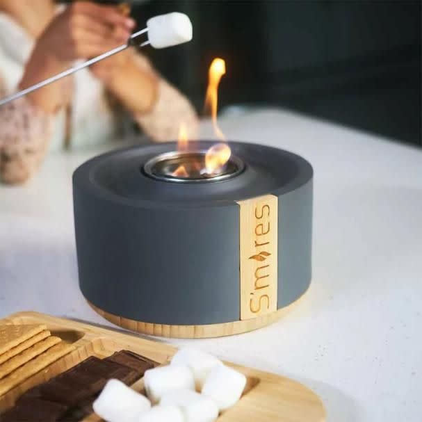 <p><a href="https://go.redirectingat.com?id=74968X1596630&url=https%3A%2F%2Fwww.solostove.com%2Fen-us%2Fp%2Fsmores-bowl%3Fsku%3DTF-SMR01-GRY%26queryID%3D5819fc17b49e811240211e464f3a0629&sref=https%3A%2F%2Fwww.womansday.com%2Frelationships%2Ffamily-friends%2Fg45604881%2Fbest-hostess-gifts%2F" rel="nofollow noopener" target="_blank" data-ylk="slk:Shop Now;elm:context_link;itc:0;sec:content-canvas" class="link rapid-noclick-resp">Shop Now</a></p><p>S'Mores Bowl</p><p>$69.99</p><span class="copyright">TerraFlame by Solo Stove</span>