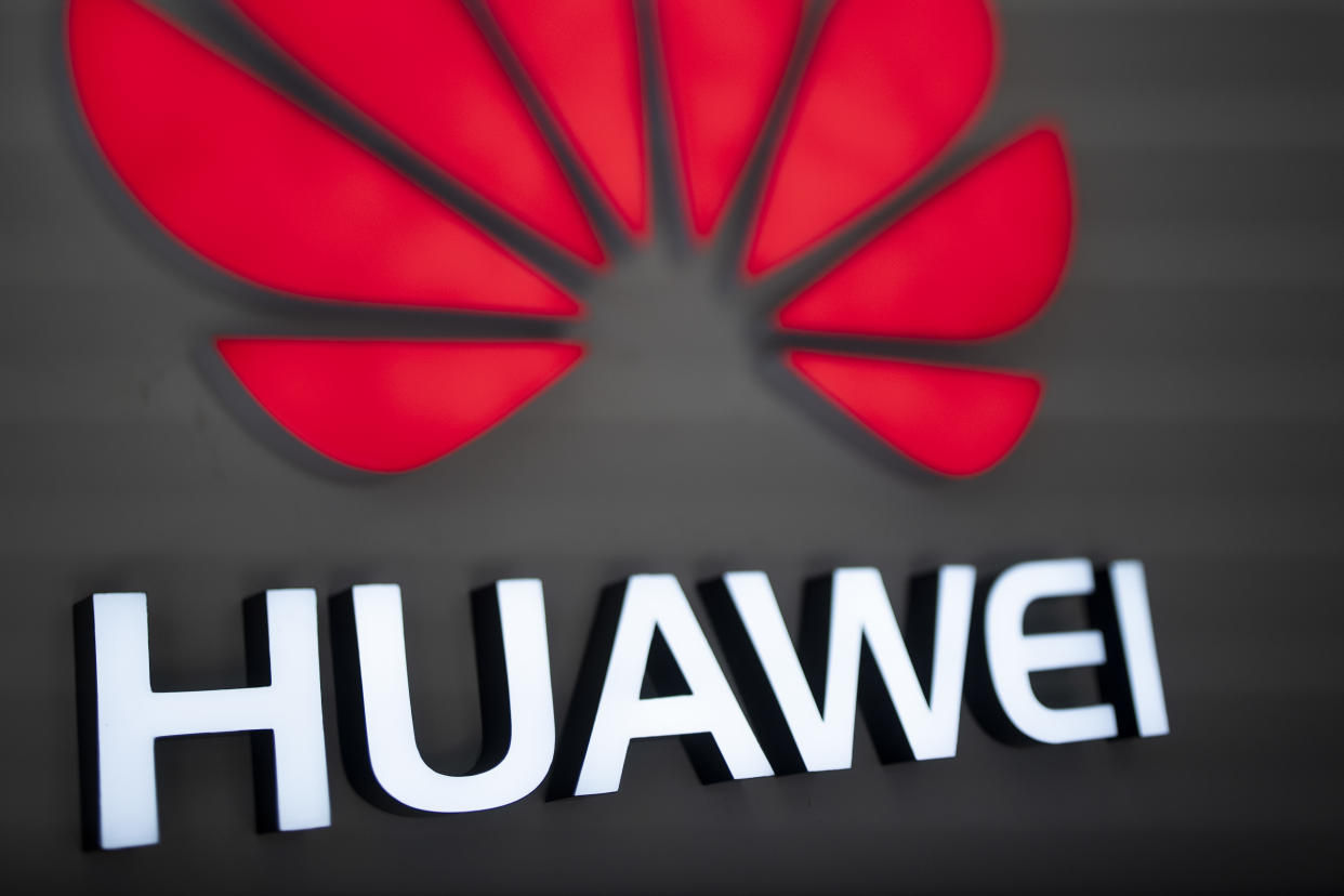 The U.S. Department of Justice unsealed a 13-count indictment against Huawei, its subsidiaries and detained executive on Monday. (AFP/| FRED DUFOUR)