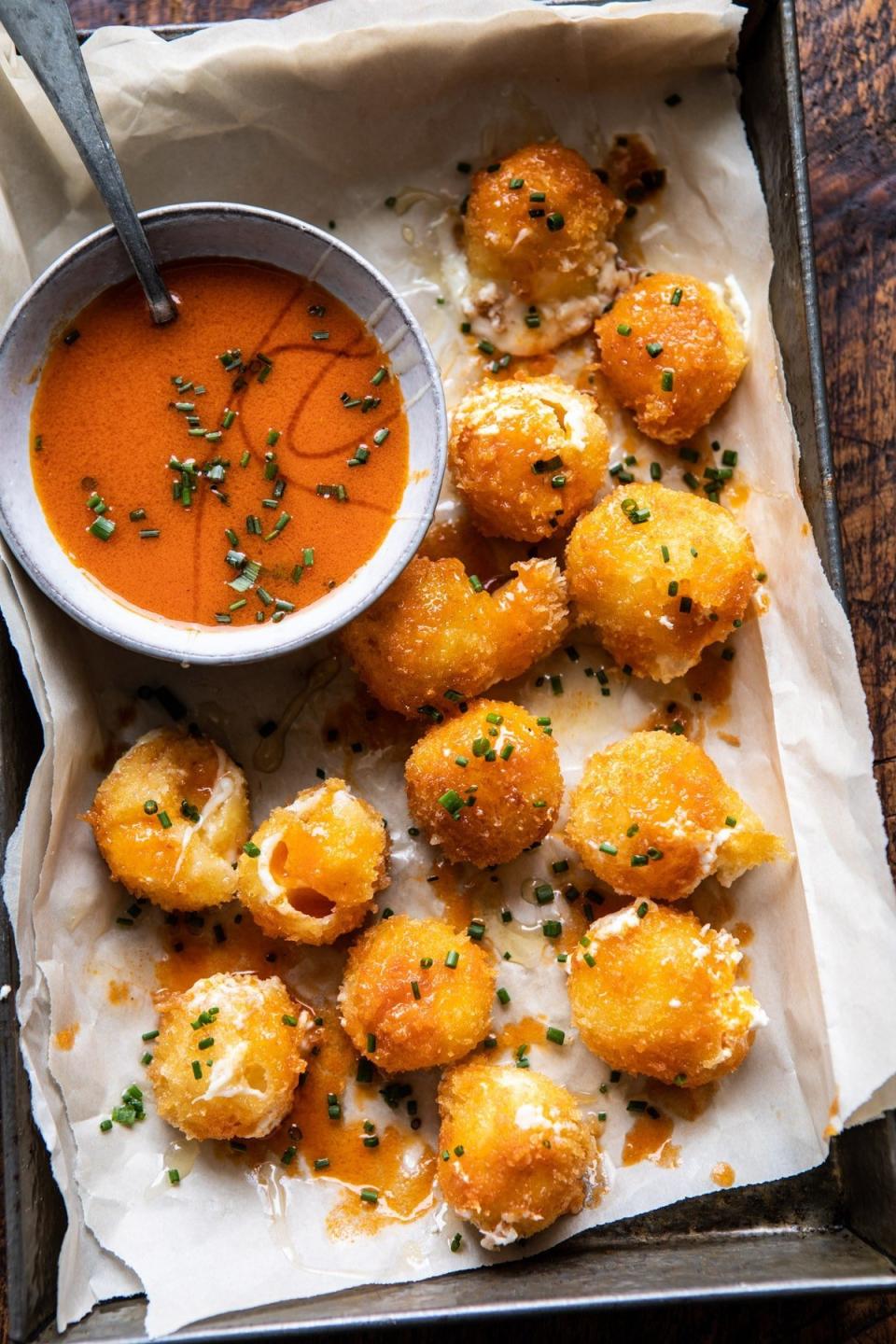 <strong>Get the <a href="https://www.halfbakedharvest.com/fried-buffalo-goat-cheese-balls/" target="_blank" rel="noopener noreferrer">Fried Buffalo Goat Cheese Balls</a> recipe from Half Baked Harvest</strong>