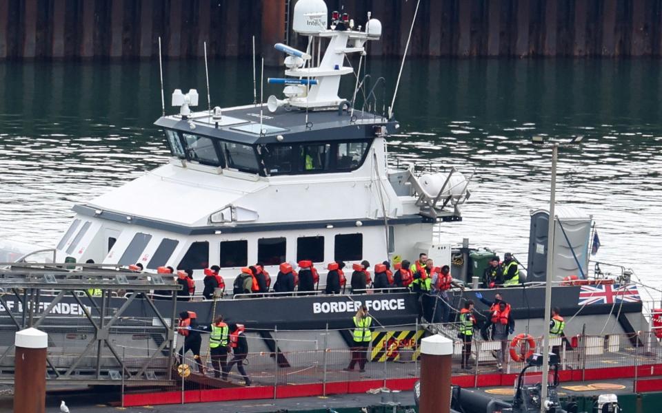 People believed to be migrants are brought in to the Port of Dover on Tuesday