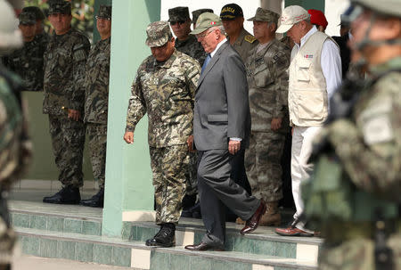 Peru's President Pedro Pablo Kuczynski participates in a military event at Rimac army headquarters in Lima, Peru March 20, 2018. Picture taken March 20, 2018. REUTERS/Mariana Bazo