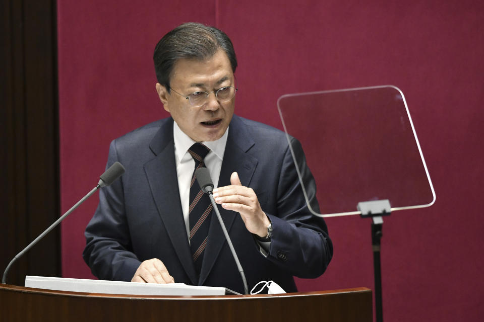 South Korea's President Moon Jae-in delivers a speech at the National Assembly in Seoul Monday, Oct. 25, 2021. Moon said Monday he’ll keep striving to promote peace with North Korea through dialogue until the end of his term next May, after Pyongyang raised animosities with a resumption of provocative weapons tests. (Jung Yeon-je/Pool Photo via AP)