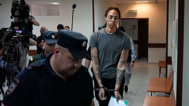 PHOTO: Brittney Griner is escorted in a court room prior to a hearing, in Khimki, Russia, Aug. 4, 2022. (Alexander Zemlianichenko/AP)