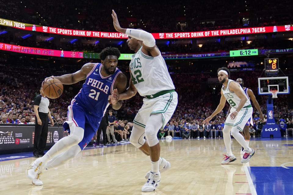 Philadelphia 76ers' Joel Embiid drives against Boston Celtics' Al Horford during the second half of Game 6 of an NBA basketball playoffs Eastern Conference semifinal, Thursday, May 11, 2023, in Philadelphia. (AP Photo/Matt Slocum)