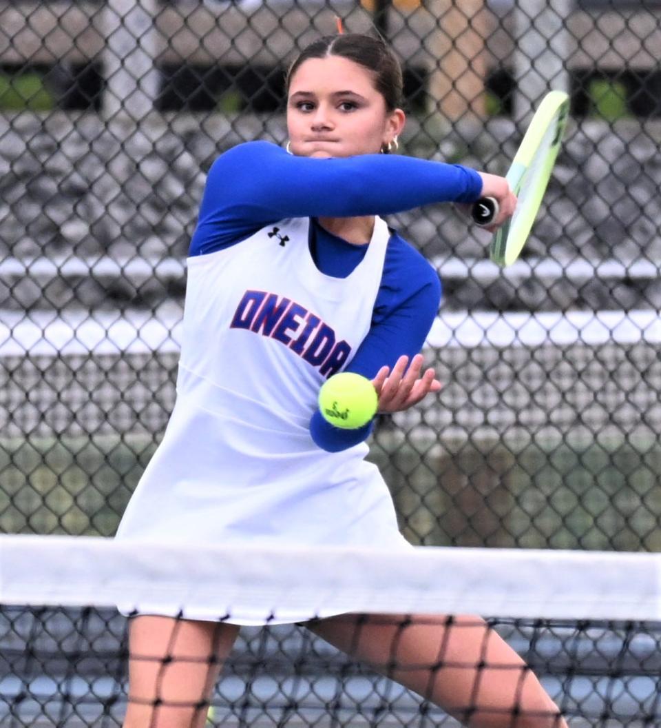 Oneida's Maddie Barretta returns a shot in singles play against Jamesville-DeWitt during Section III's Class B team tennis final Thursday.