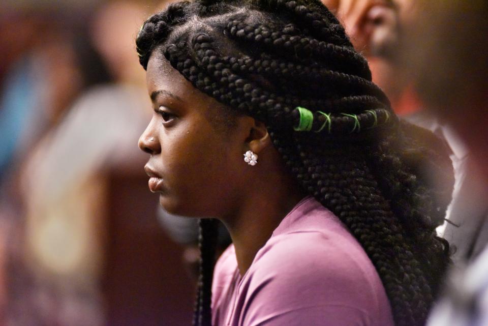 Kamiyah Mobley, who was raised with the name Alexis Manigo, sits in the courtroom during the second day of the sentencing hearing of Gloria Williams in 2018 in Jacksonville. Williams pleaded guilty in her kidnapping as the infant Kamiyah Mobley from University Medical Center in 1998.