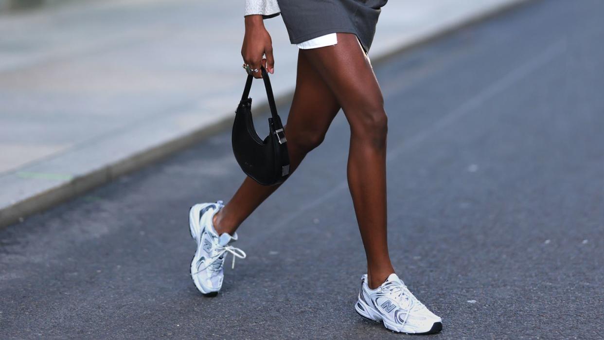 womens legs with sneakers