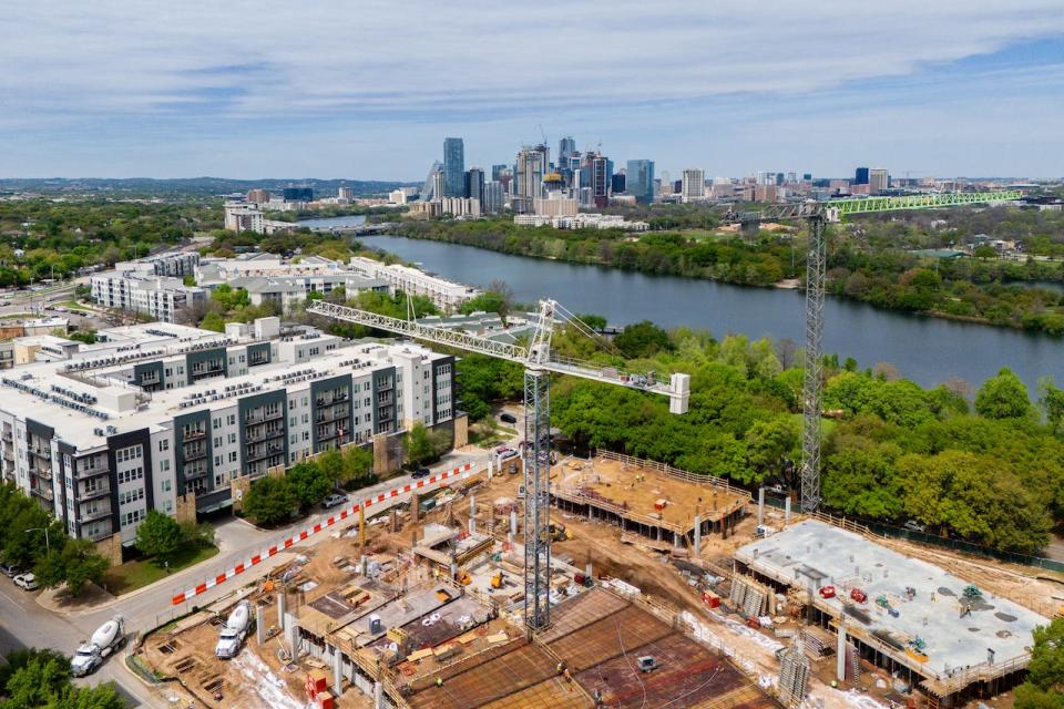 In an aerial view, the groundwork for apartments is seen undergoing construction on March 19, 2024 in Austin, Texas.