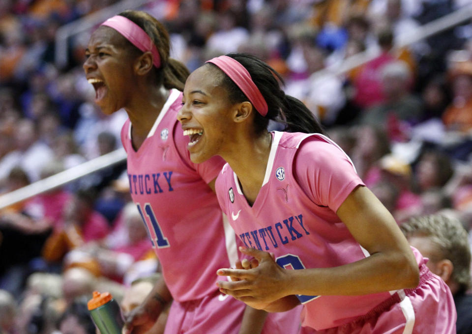 Kentucky forward Jelleah Sidney (12) and forward DeNesha Stallworth (11) celebrate in the final seconds of an NCAA college basketball game against Tennessee, Sunday, Feb. 16, 2014, in Knoxville, Tenn. Kentucky won 75-71. (AP Photo/Wade Payne)
