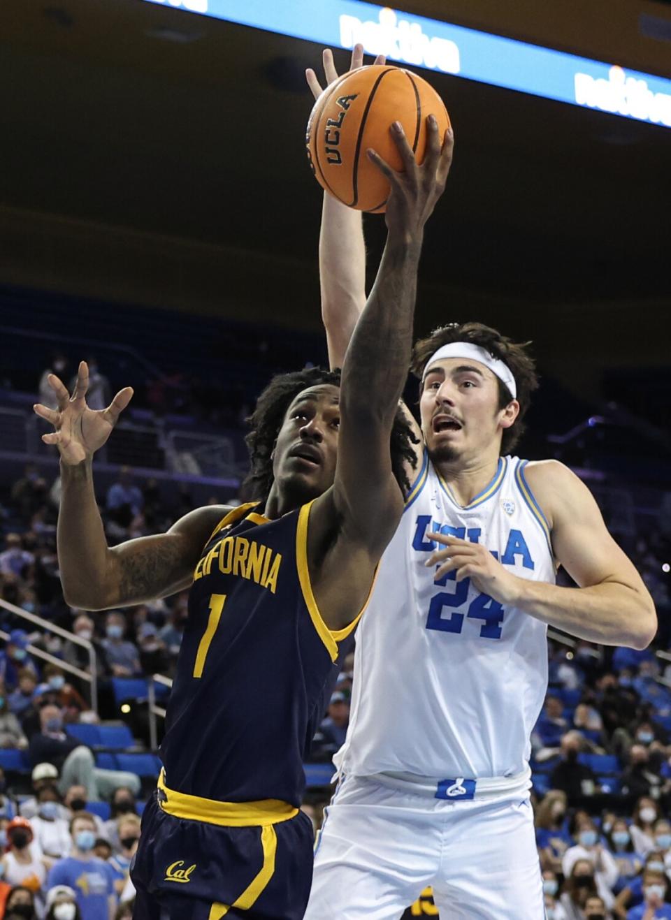 UCLA guard Jaime Jaquez Jr. tries to stop California guard Joel Brown.