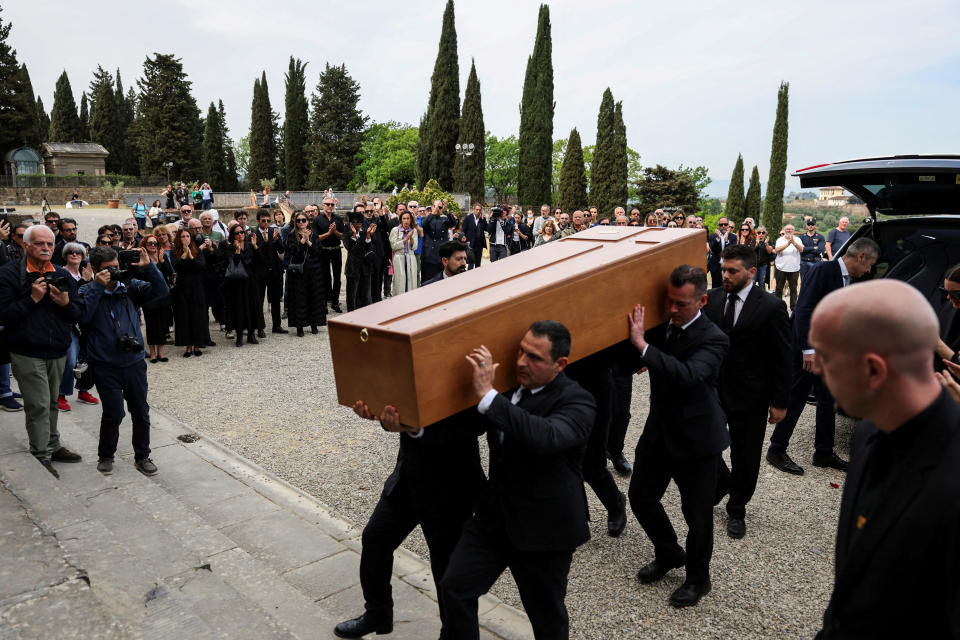 Pallbearers carry the coffin of Italian designer Roberto Cavalli on the day of his funeral in Florence, Italy, April 15, 2024. REUTERS/Yara Nardi