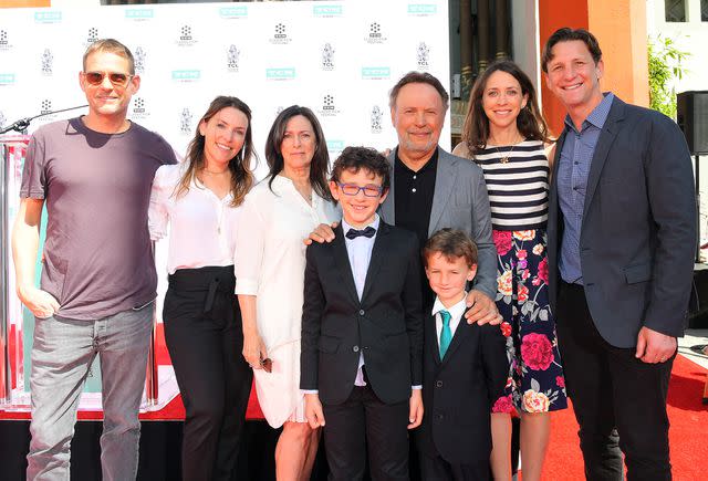 <p>Charley Gallay/Getty</p> Billy Crystal and his family attend the Hand and Footprint Ceremony: Billy Crystal at the 2019 10th Annual TCM Classic Film Festival