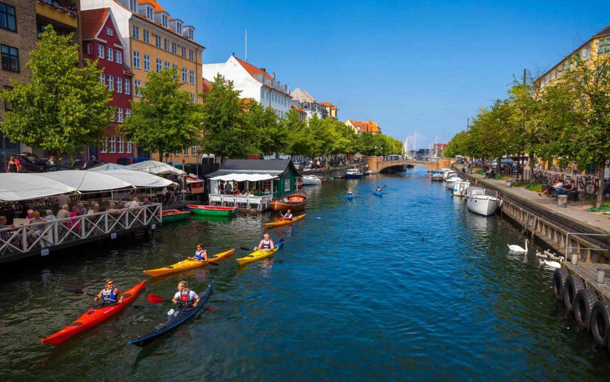 Kayakers in Copenhagen, the five best cities to visit in summer