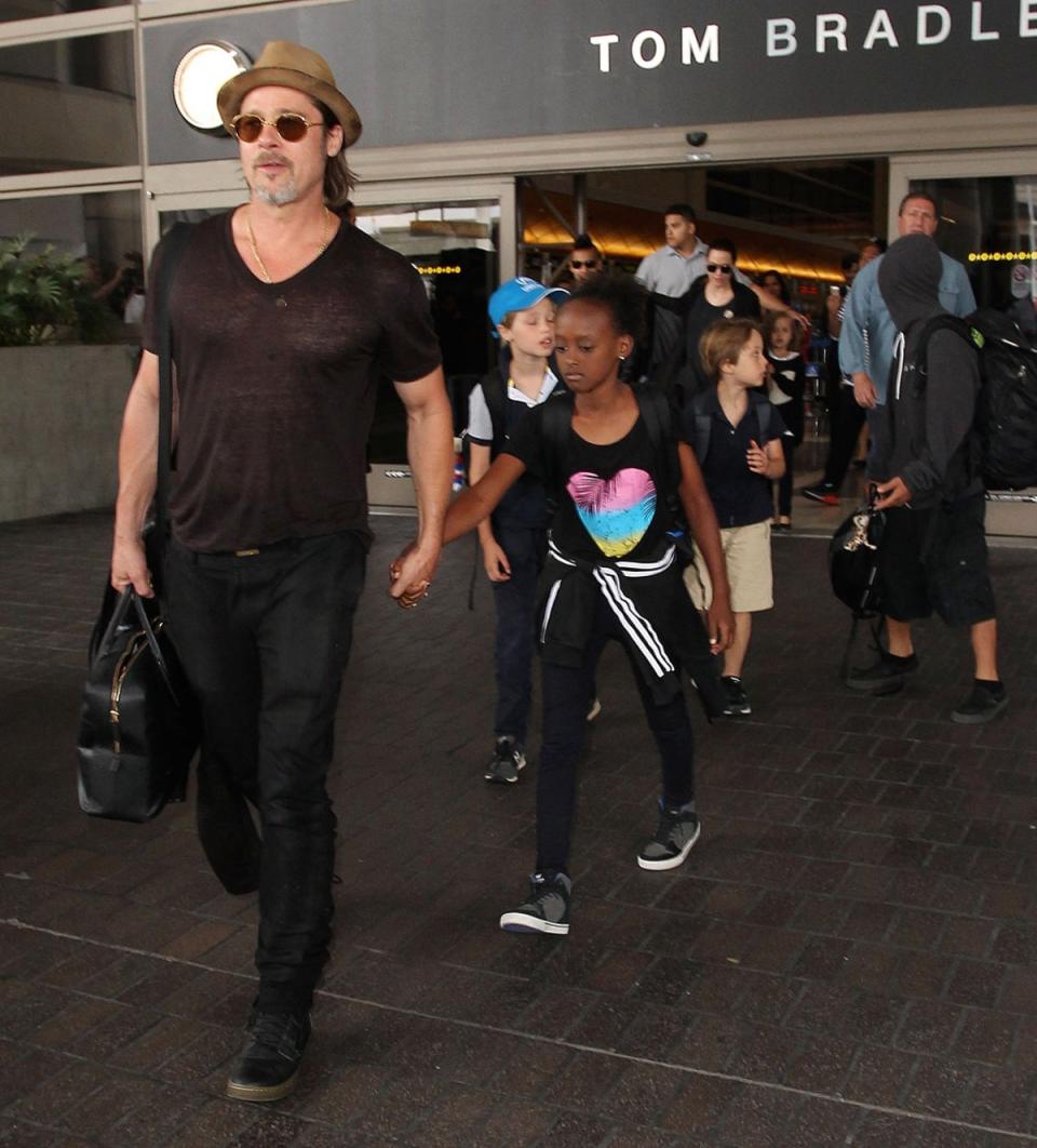 Brad Pitt and Family arriving at the Los Angeles International Airport on 05 July 2015 (Rex)