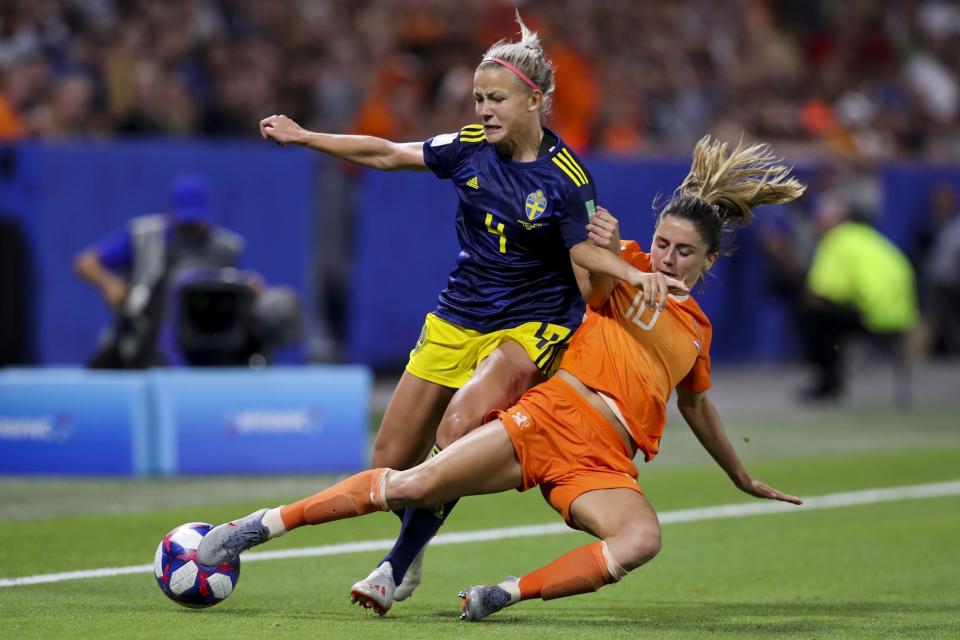 Sweden's Hanna Glas, left, is tackled by Netherlands' Danielle Van De Donk during the Women's World Cup semifinal soccer match between the Netherlands and Sweden, at the Stade de Lyon outside Lyon, France, Wednesday, July 3, 2019. (AP Photo/Francisco Seco)