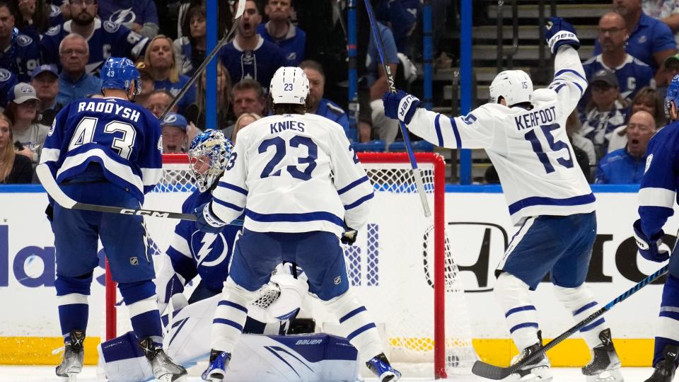 Alex Kerfoot's deflection in overtime capped off a dramatic comeback for the Maple Leafs as they took a commanding 3-1 series lead over the Lightning. (Associated Press)