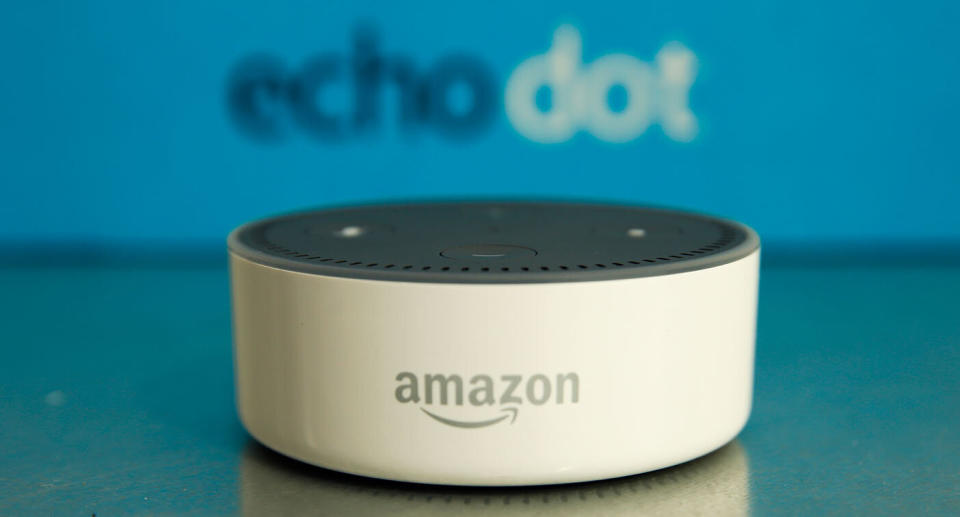 The Amazon "Echo Dot" device sits during the U.K. launch event for the Amazon Echo voice-controlled home assistant speaker.