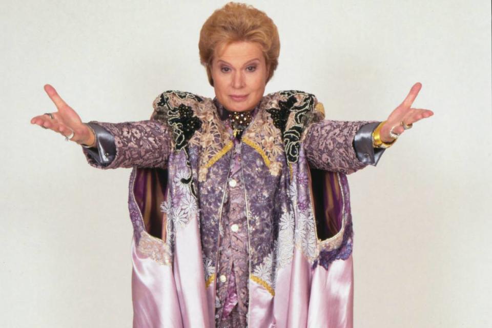 The late astrologer Walter Mercado in full regalia in a scene from ‘Mucho mucho amor.’
