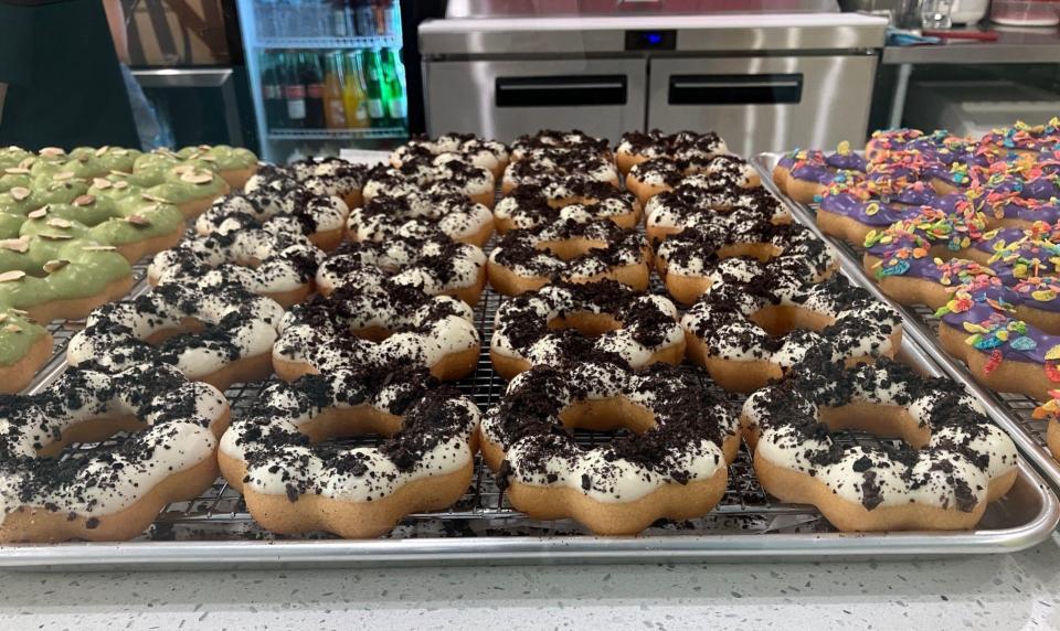 A tray of freshly made Cookie and Cream Mochi donuts at newly opened Mochinut, a Los Angeles-based Asian-style bakery and cafe that debuted Saturday, March 2, 2024 at 11757 Unit 9 in Jacksonville. The restaurant features Mochi donuts, Mochi balls Korean hot dogs, Boba teas and ice cream.