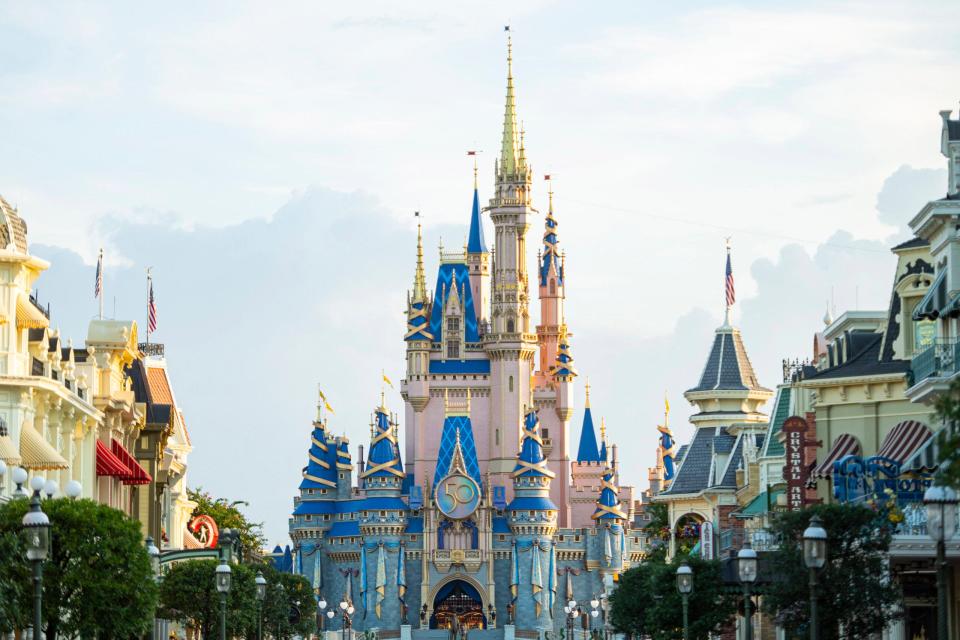 A new crest honoring the 50th anniversary of Walt Disney World Resort adorns Cinderella Castle at Magic Kingdom Park.