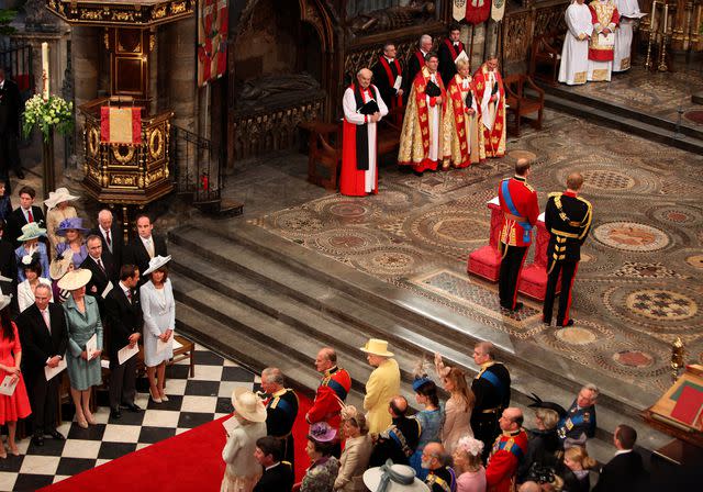 <p>Clara Molden - WPA Pool/Getty</p> Prince William and Prince Harry standing at the altar on William's wedding day