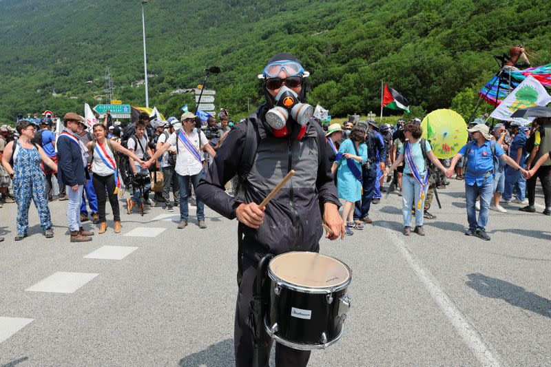 Activists take part in a protest against the Lyon-Turin rail link between France and Italy in La Chapelle