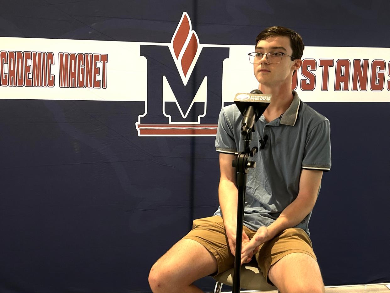 Microsoft Office state championship Samuel Latham sits in the hallway of Madison Academic High School as he talks to the media in Jackson, Tenn. on June 20, 2023.