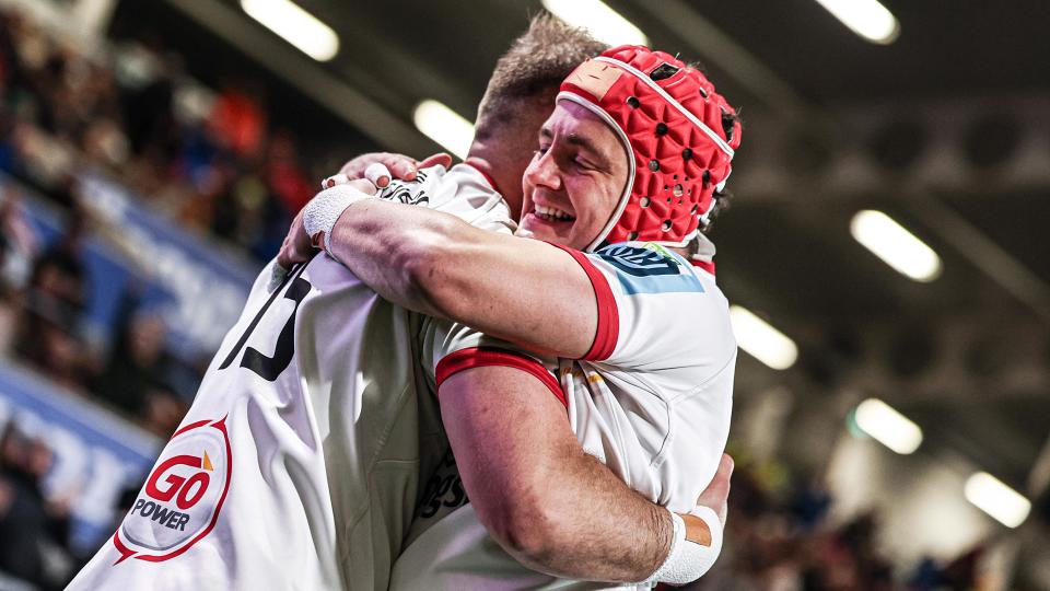 Mike Lowry celebrates a try with Will Addison