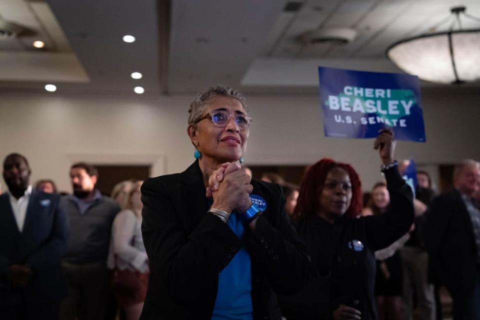 <div class="inline-image__caption"><p>North Carolina Democratic Party member Diane Robertson reacts as she follows election results at an election night party for Democratic U.S. Senate candidate Cheri Beasley. </p></div> <div class="inline-image__credit">Allison Joyce/Getty Images</div>