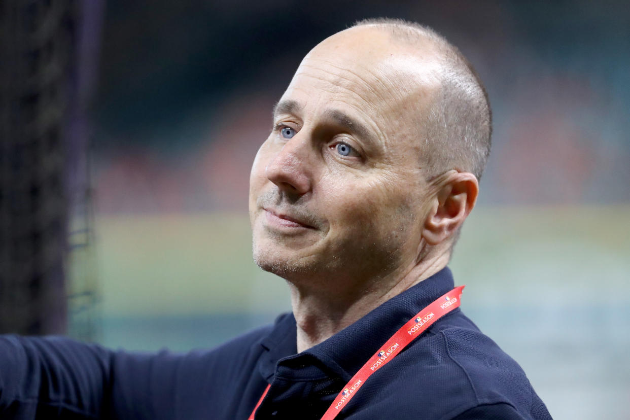 Police body cam shows brief but tense confrontation as Connecticut officers draw guns on Yankees GM Brian Cashman. (Photo by Elsa/Getty Images)