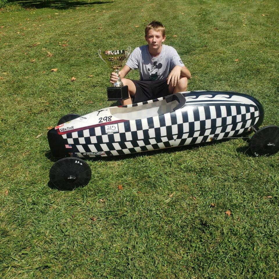 Caiden Clements, 17, after competing in a Soap Box Derby competition.