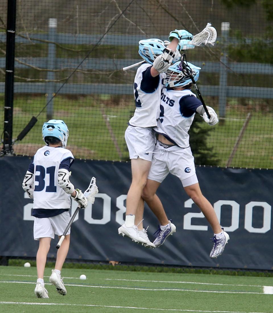 CBA's Davis Campbell (#2-right) celebrates his goal against Wall at home Wednesday, April 10, 2024, with teammate Ryan Martin (#22).