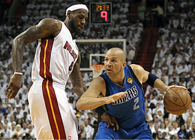 Kidd drives against LeBron James during Game 6 of the NBA Finals. Kidd finished the clinching victory with nine points and eight assists
