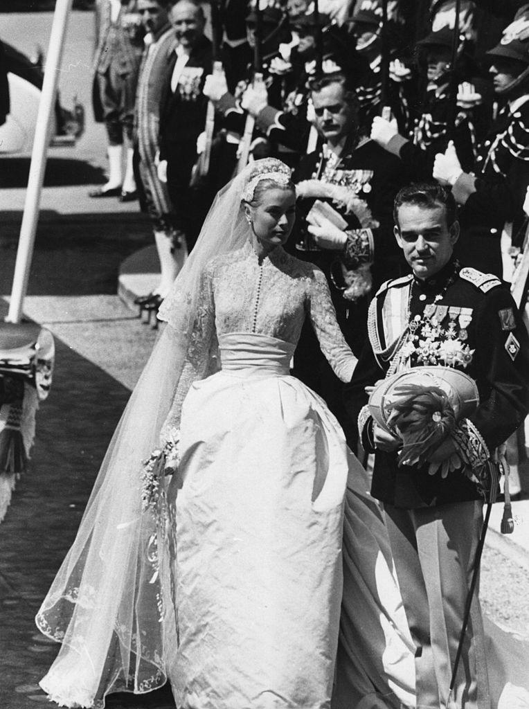 grace kelly wedding dress, The wedding of Prince Rainier III of Monaco, Louis Henri Maxence Bertrand de Grimaldi, to American actress Grace Kelly, known thereafter as Princess Grace.  Original Publication: Picture Post - 8336 - The Hour Of Marriage - pub. 1956 (Photo by Joseph McKeown/Getty Images)