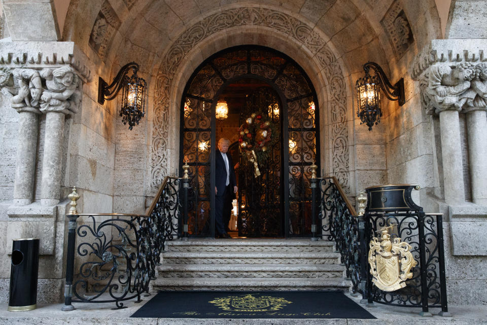 FILE - President-elect Donald Trump arrives to speak to reporters at his Mar-a-Lago estate, Wednesday, Dec. 28, 2016, in Palm Beach, Fla. (AP Photo/Evan Vucci, File)