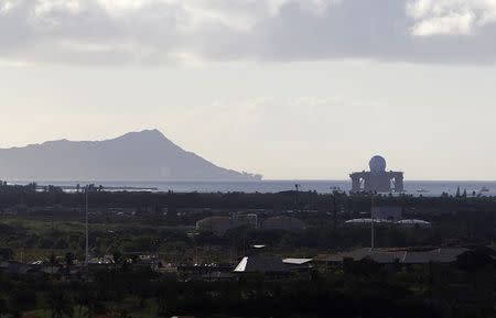 The U.S. Navy Sea-based X-Band radar leaves Pearl Harbor as two hurricanes approach the Hawaiian islands, in Honolulu, Hawaii, August 6, 2014. REUTERS/Hugh Gentry